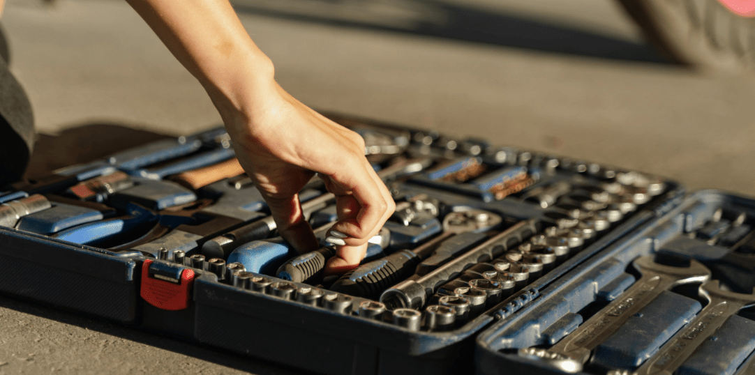 A Toolbox with hand reaching in